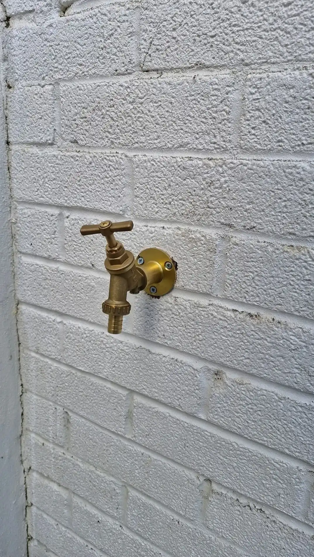 Wall mounted tap.